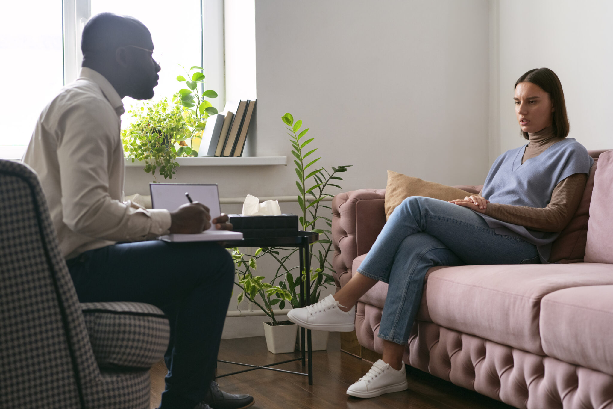 person-sharing-feelings-emotions-therapy-session Psychology Therapy