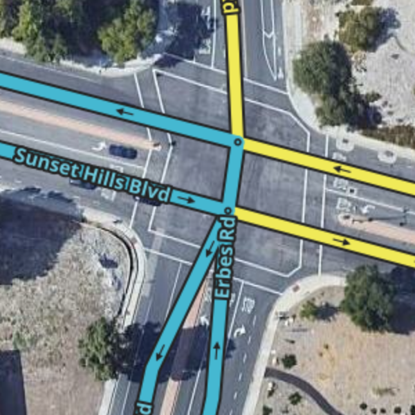 File:Transitioning (divided-2-way) road intersecting a divided road.png