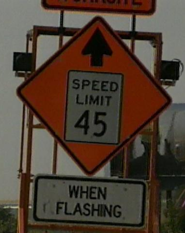 File:When-Flashing-speed-limit-sign.png