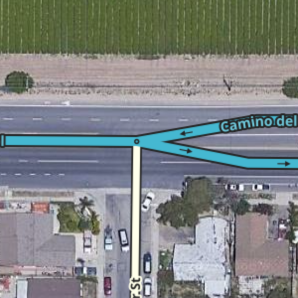 File:2-way road T at a 2-way road transitioning to a divided road.png