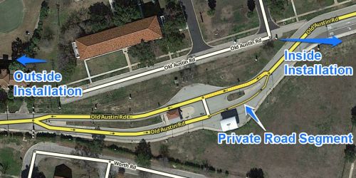 500pxSTANDARD Gate treatment example.Note that this road is of a "primary" type but the private segment used for the inbound lane is used to prevent through-routing. Nested Security Bases may have a Private Road for the Base exit.