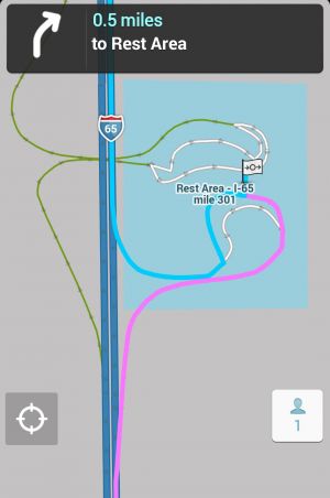 The route enters the lot from the Northbound lot, makes the loop at the stop point, and continues back out through the same lot onto the NB lanes.