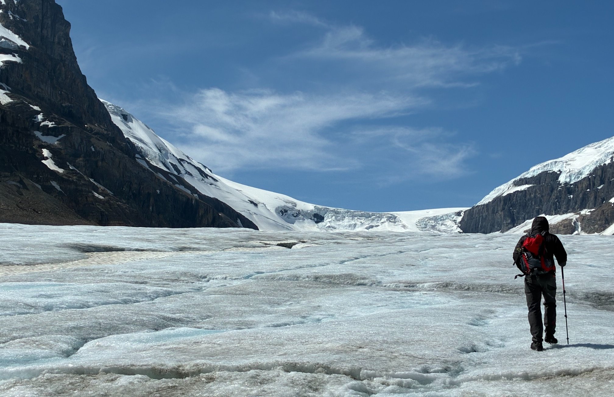 "With every 0.1 degree of global warming we add to the total degradation of the system”, says Donovan Dennis, here walking on the Athabasca Glacier in Canada.