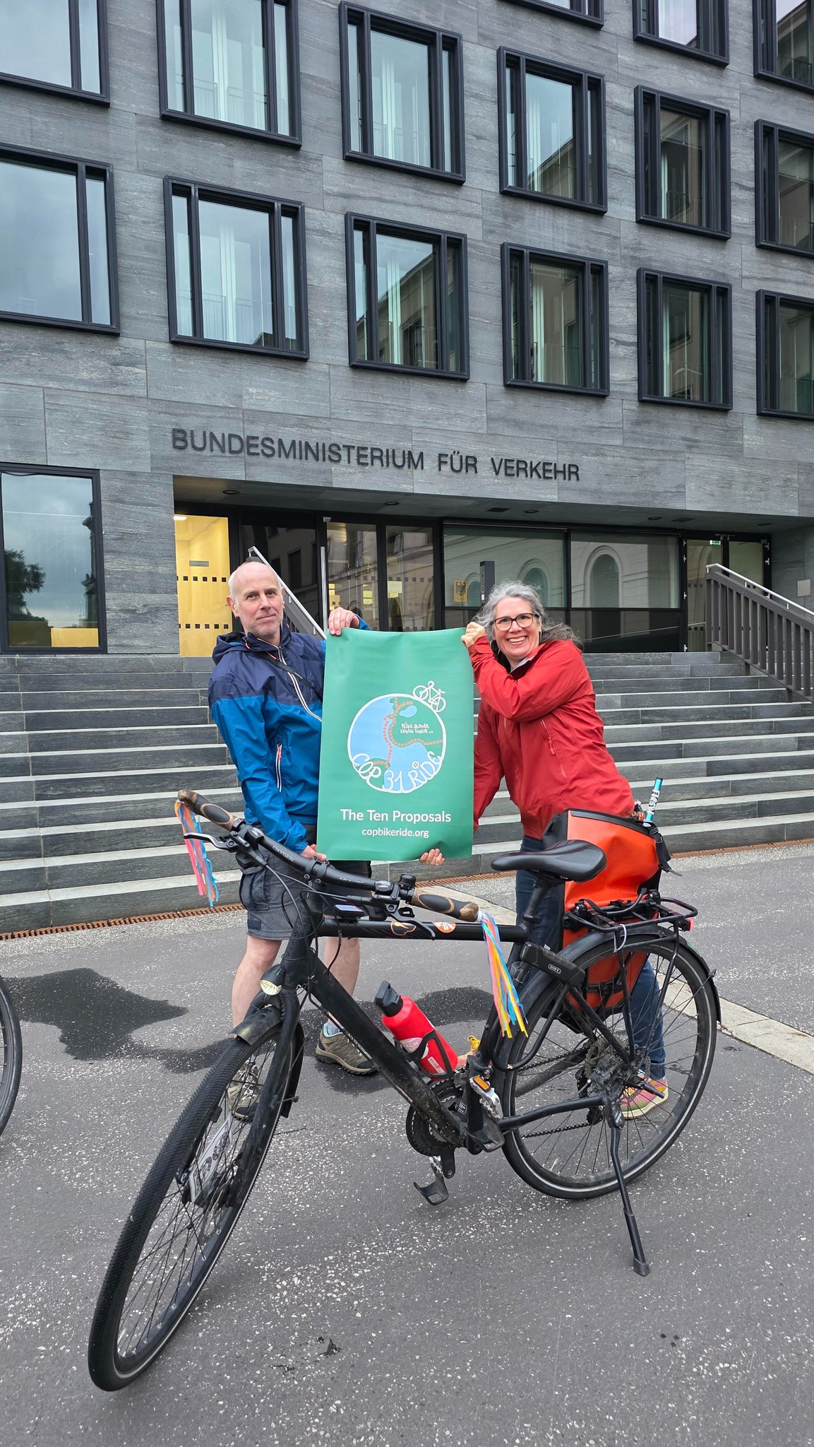 Film maker and science communicator Sybille Grunze and Volker Mai, film maker and photographer outside the German transport ministry. Credit Respect Cyclists