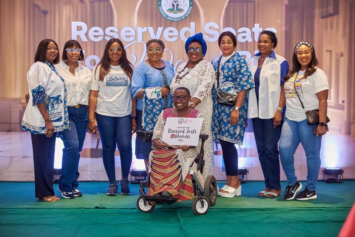 Committee members and advocates for the reserved seats bill