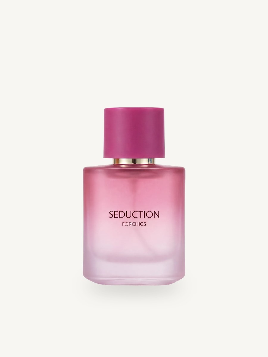 ForChics Seduction pheromone perfume in a pink square frosted-glass bottle with a magenta cap, on a plain light background