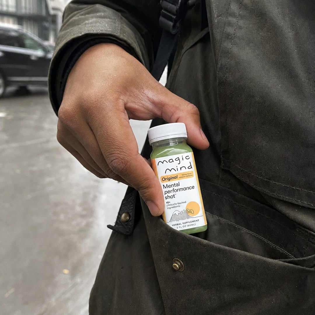 Pulling a Magic Mind shot out of a jacket pocket on the way to work