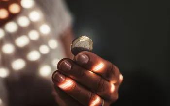 Inflation_Coin_Money_Hand