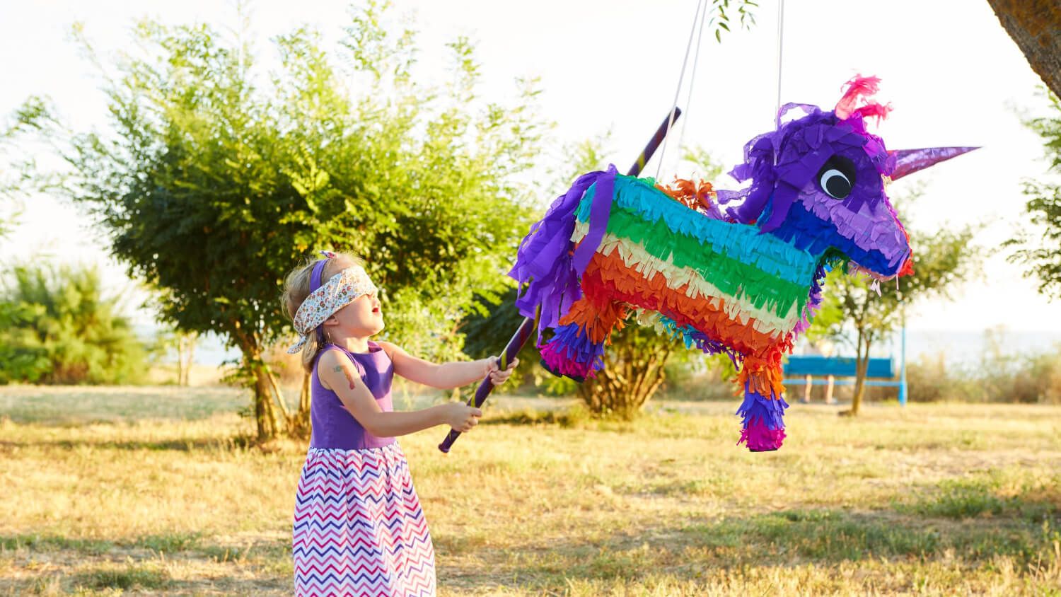 Colorful fiesta party scene with piñata game