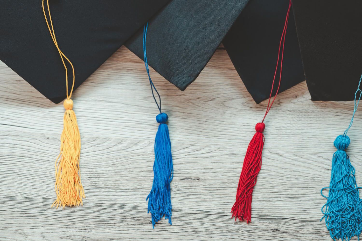 Colorful graduation tassels on a display