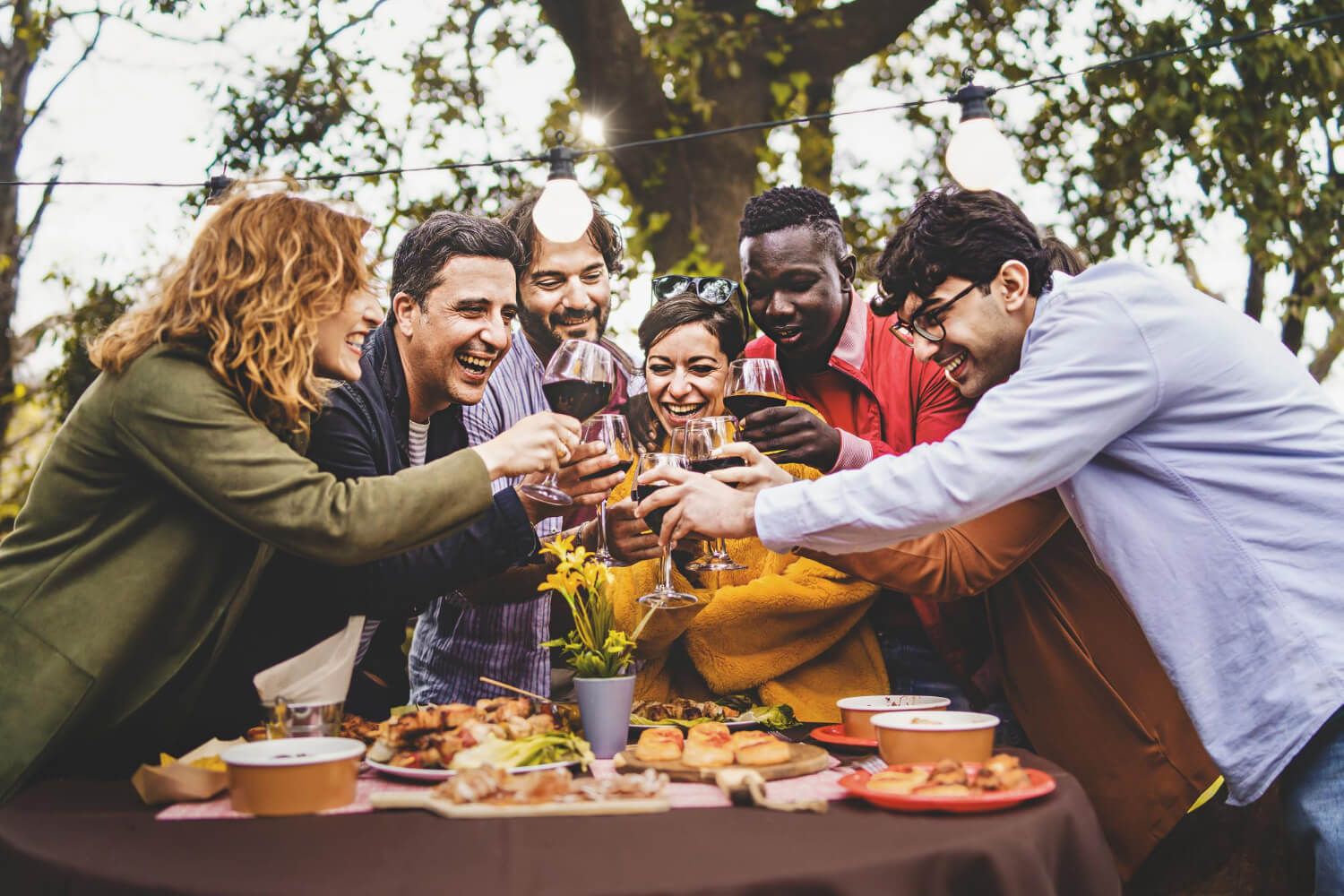 Friends celebrating Thanksgiving in an outdoor setting