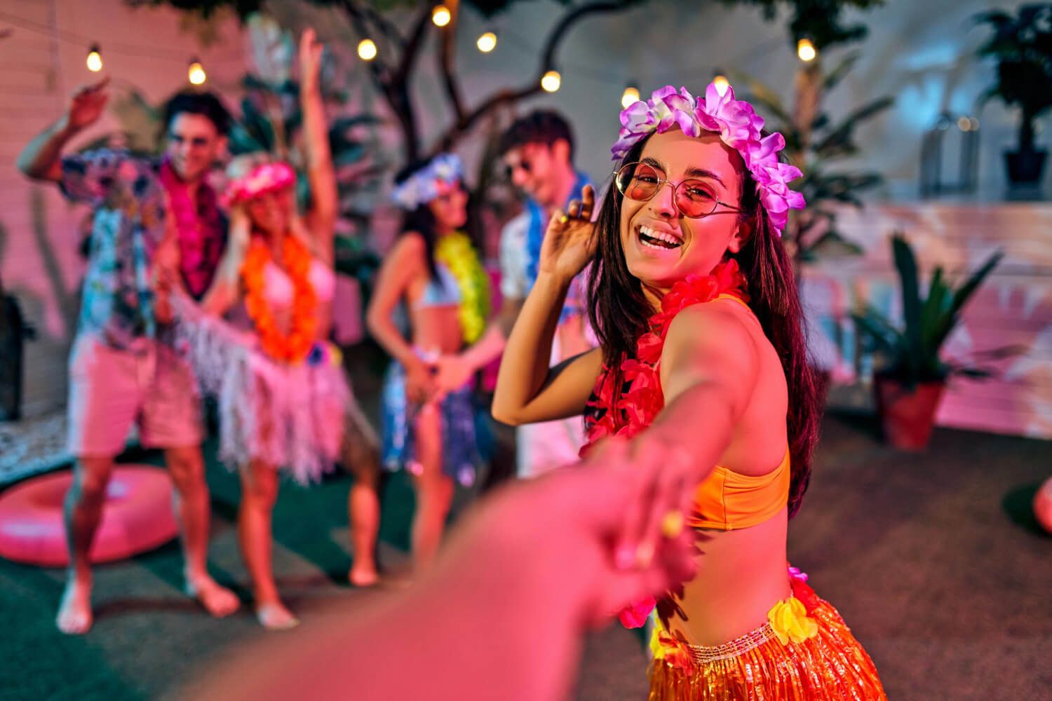 Hula dance performance at Hawaiian Luau party