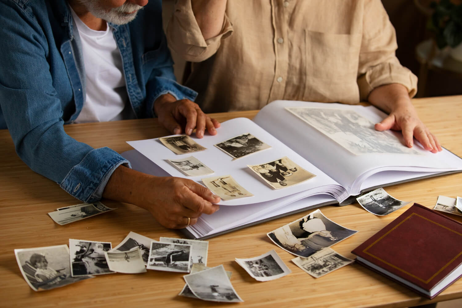 Open photo book displaying cherished memories from trips