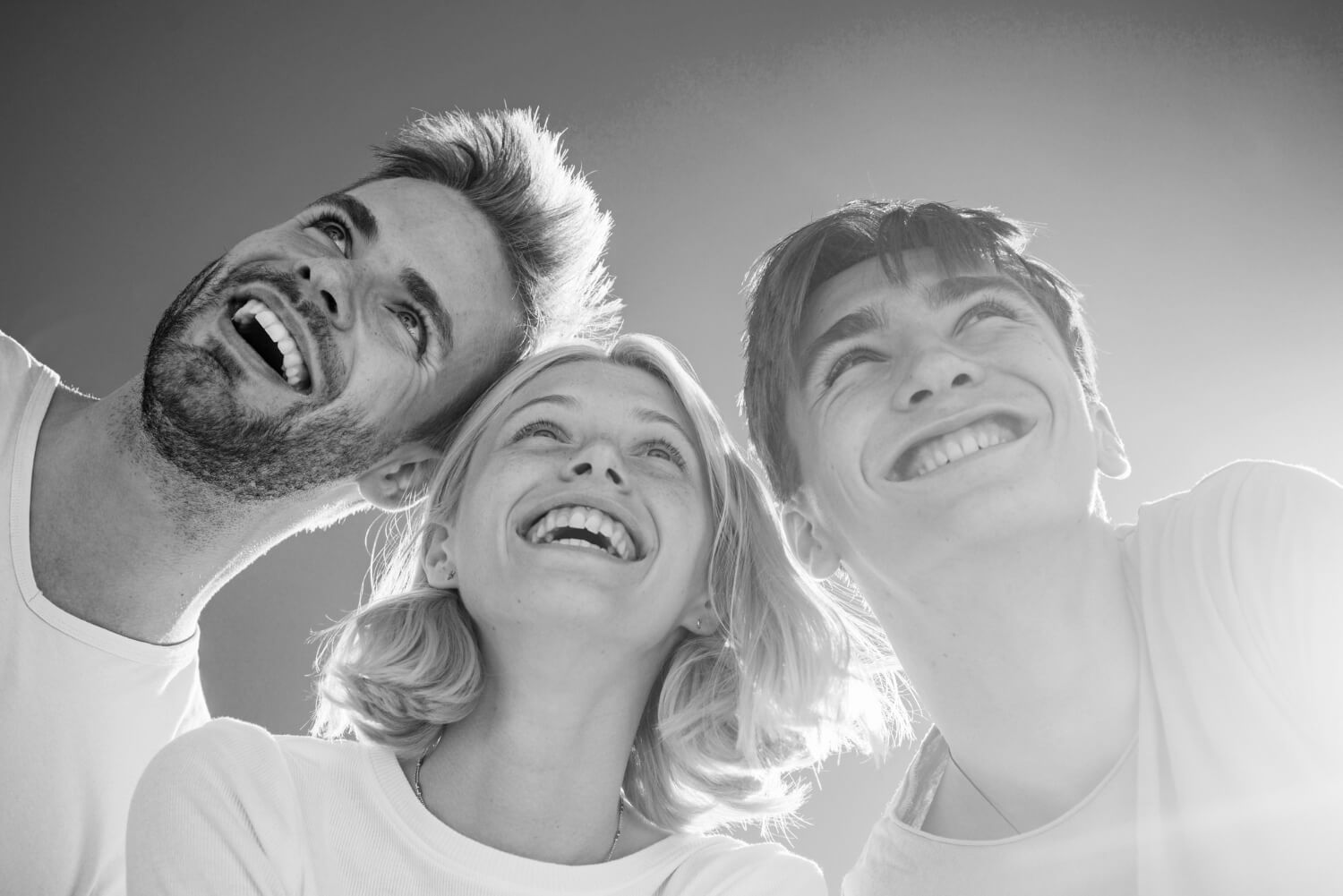 People laughing together showcasing the power of laughter and positivity