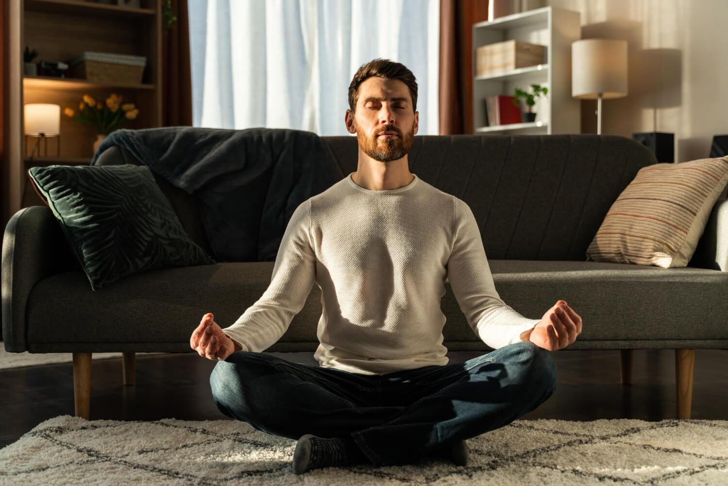 Person in meditative pose focusing on wellness and self-care