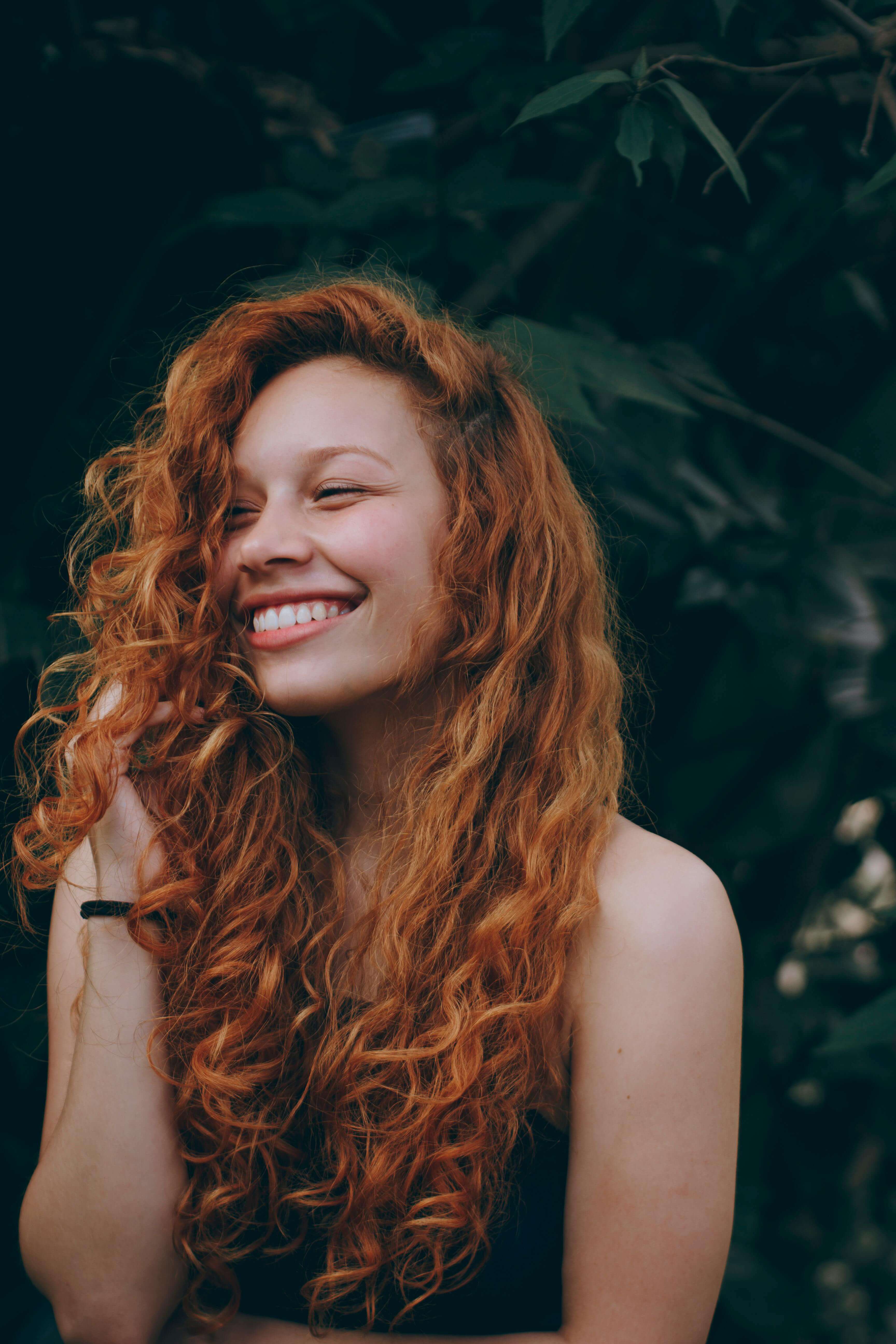 red headed woman smiling