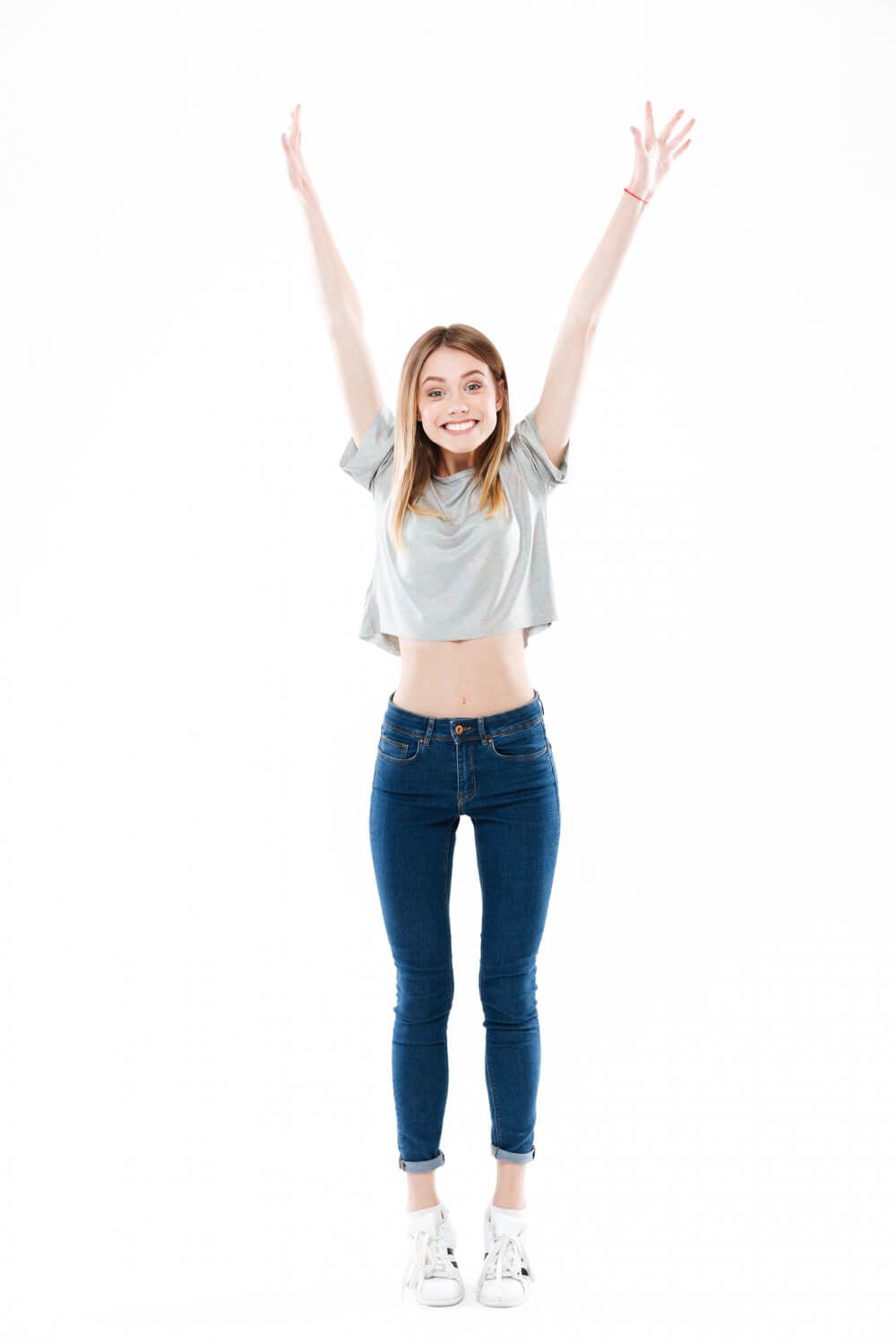 Woman standing tall with a victory gesture