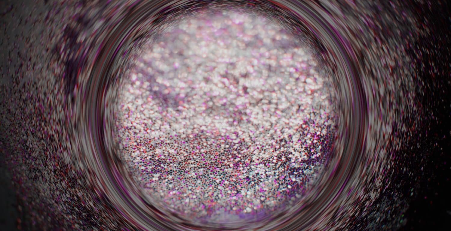 Blue glitter swirl with pink bokeh light on a sequin texture background