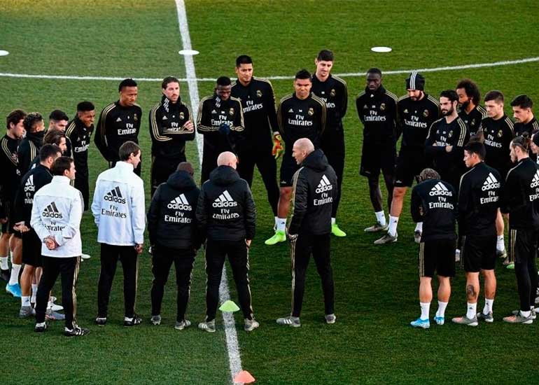 Portada: La Liga española suspendida y plantel del Real Madrid en cuarentena