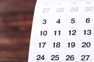 Close up of a white paper calendar