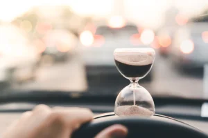 hourglass sitting on top of a car dash