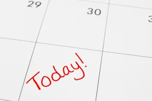 close up of a calendar with the word today written on one of the days