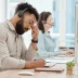 frustrated representative working at an auto warranty call center