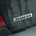 closeup of AWD badge on the rear of a black vehicle