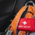 Car emergency kit including a first aid kit