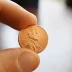 2021 US penny held in hand