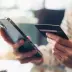 Woman buying an affordable extended warranty on her phone through the Cuvrd platform