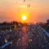very dirty windshield driving into the sunset