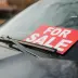 for sale sign in the window of a car with an active extended warranty