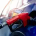 blue car getting gassed up
