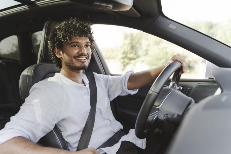 Happy driver with an auto repair coverage plan