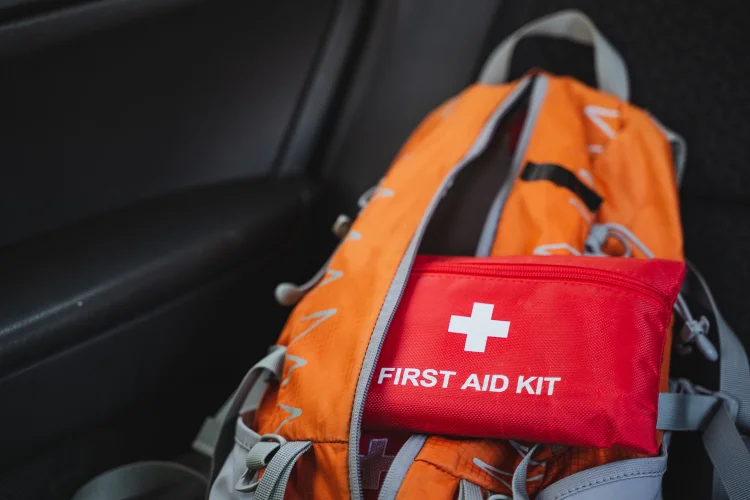 Car emergency kit including a first aid kit