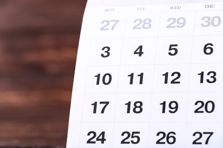 Close up of a white paper calendar