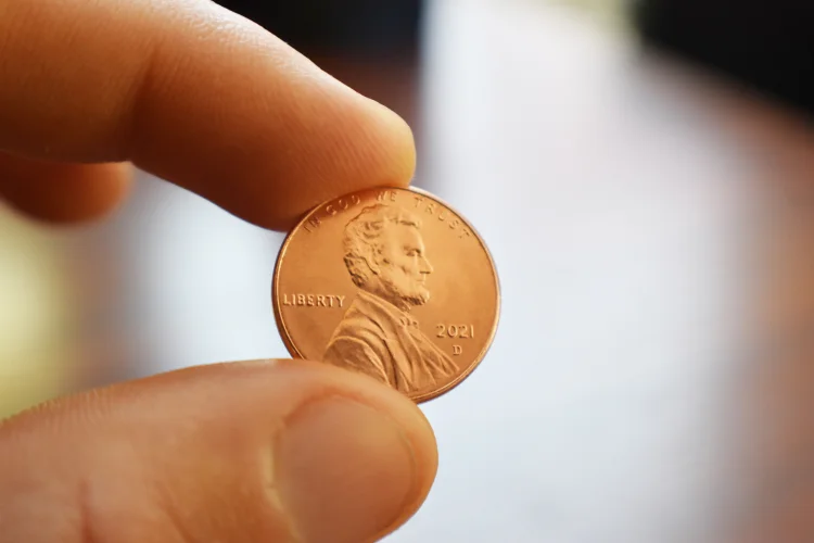 2021 US penny held in hand