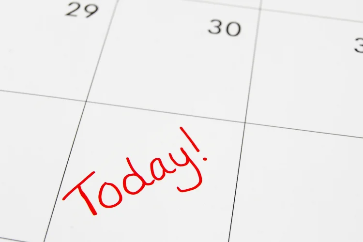 close up of a calendar with the word today written on one of the days