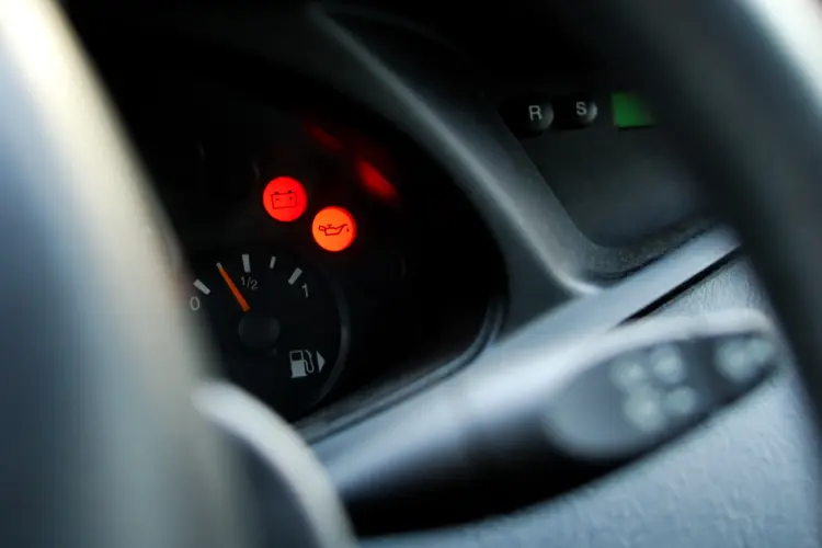 Illuminated oil light on a car's dashboard