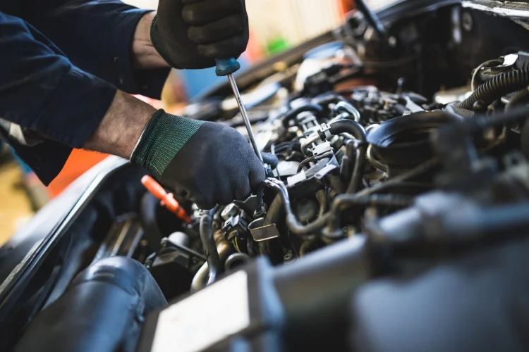 mechanic working on a car