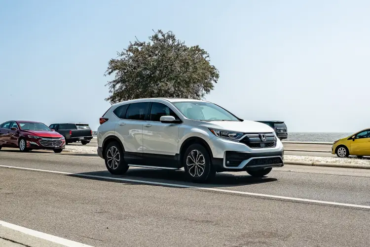 White Honda CR-V in a parking lot
