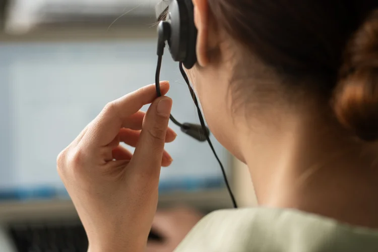 warranty administration customer service representative on the phone with a customer