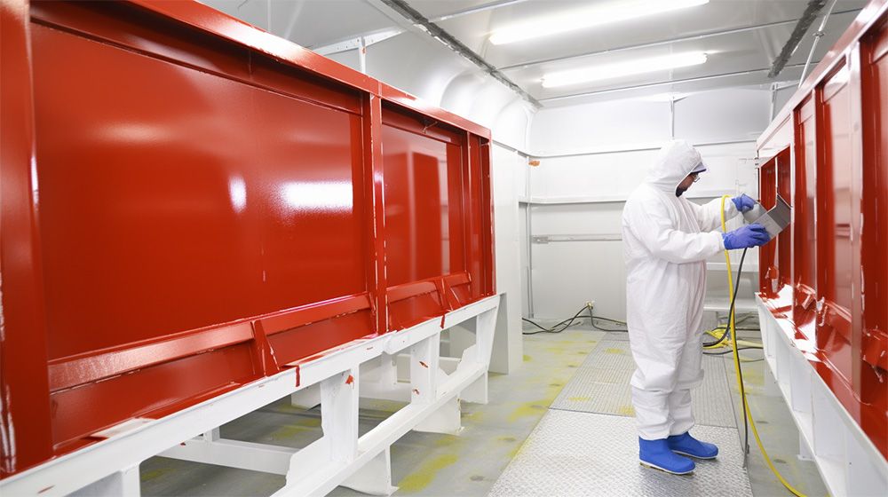 A person inside an electrostatic paint shop