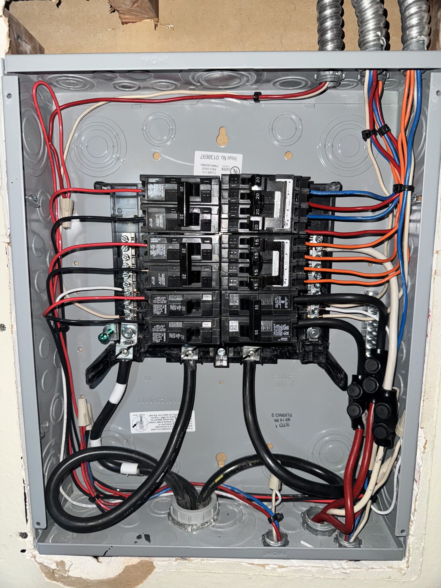 Electrical panel with neatly organized breaker wiring