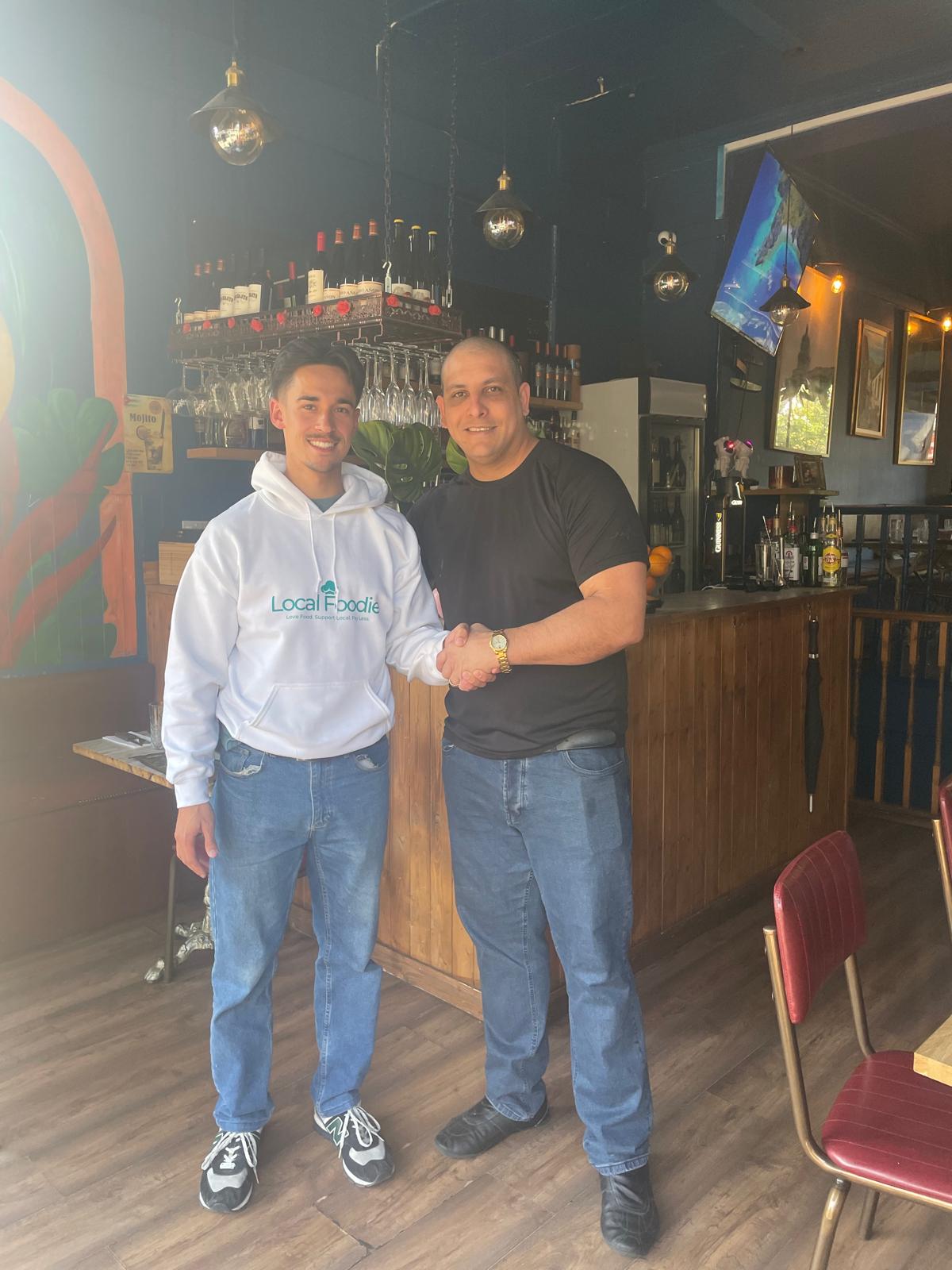 Talking through the loyalty QR with a restaurant owner