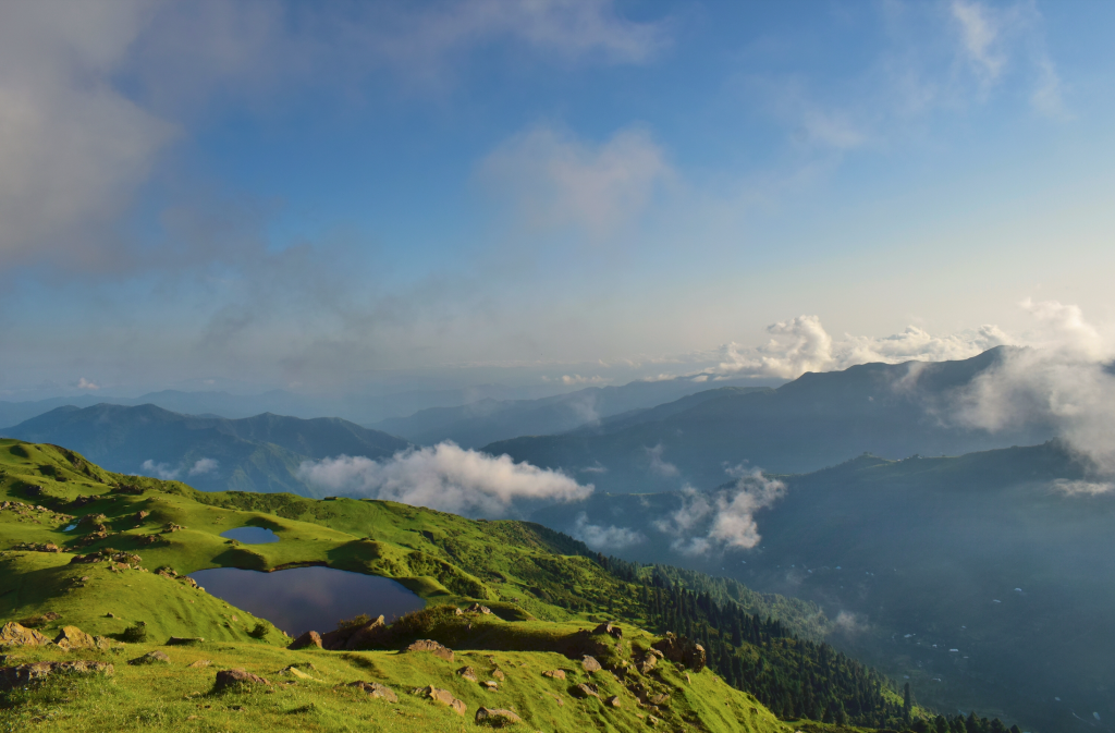 landscape phot showing mostly the sky and parts of the mountain ranges