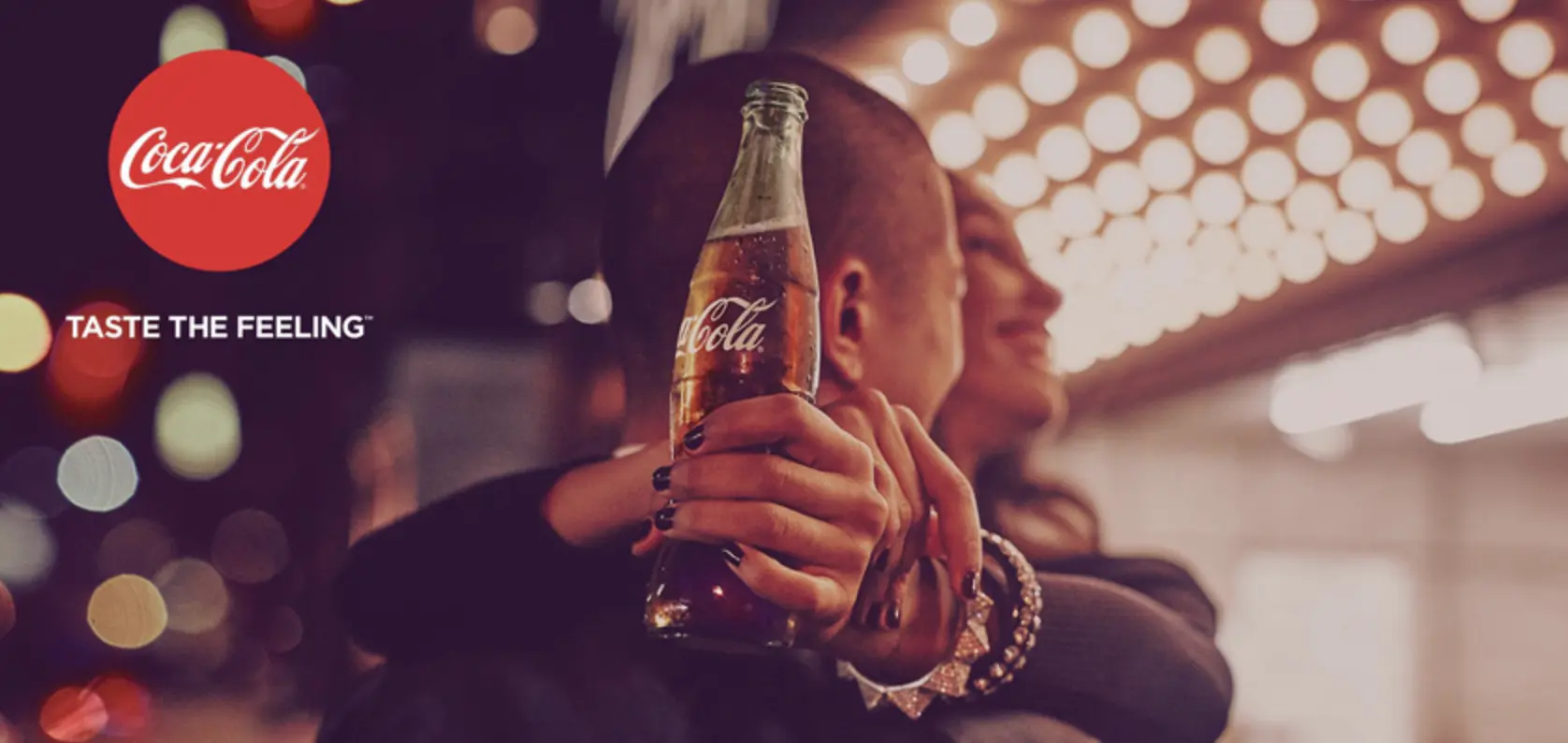 This image shows a screenshot of the Coca Cola Taste the Feeling campaign
