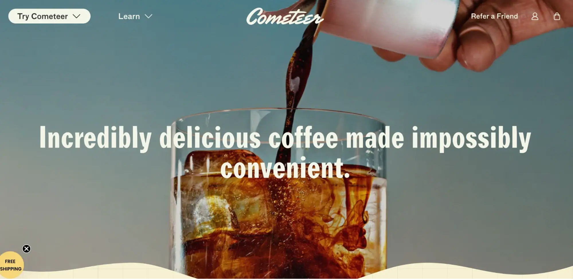 This image shows the Cometeer landing page showing iced coffee being poured into a glass with the text 'Incredibly delicious coffee made impossibly convenient'.