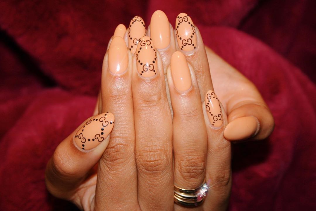 The Logomania Manicure Is The Newest Nail Art Trend Taking Over